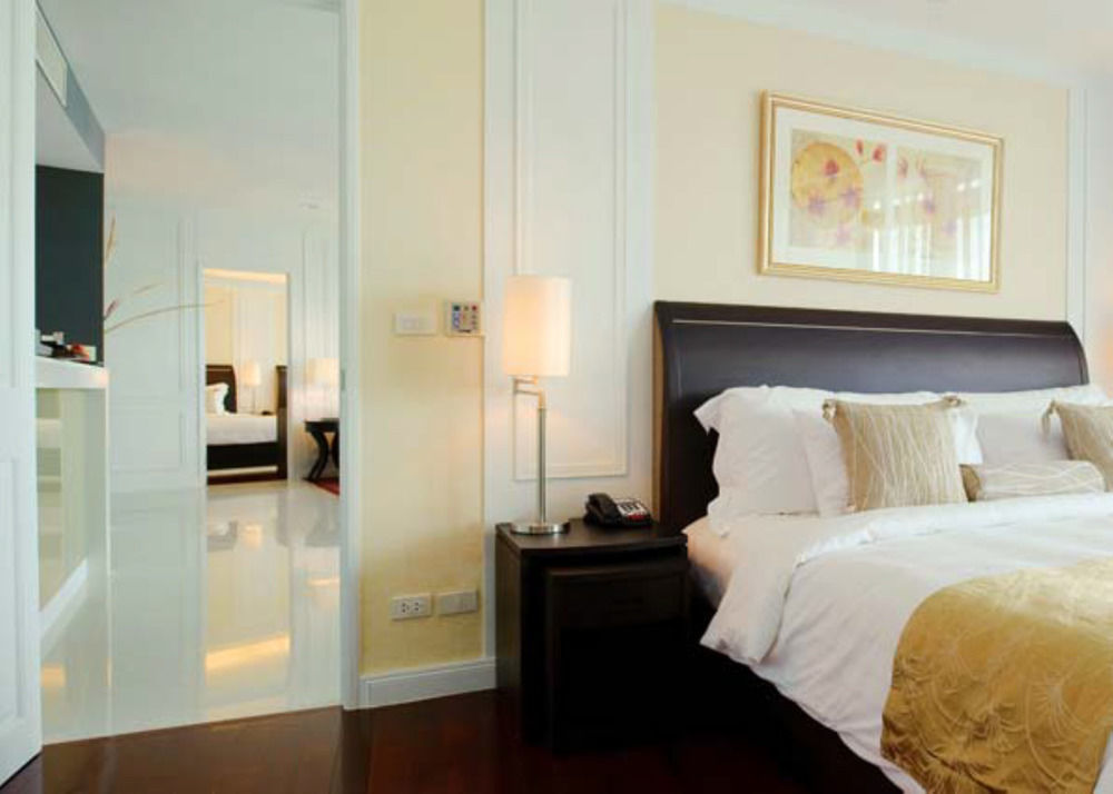 Dusit Suites Hotel Ratchadamri, Bangkok Extérieur photo A bedroom at the hotel